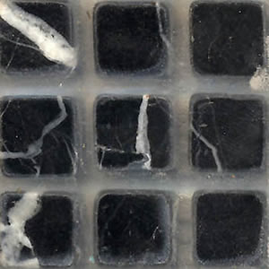 Tile Field Black tumbled marble 1 x 1 logo